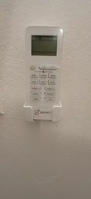 a cell phone is attached to the wall at Beach Front Haven, by More Than Beauty Properties in Tortola Island