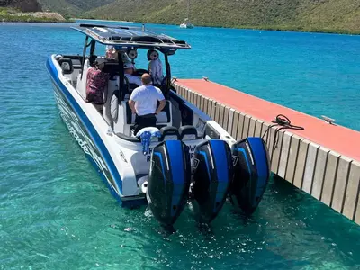 a group of people on a boat on the water at Villa Modere' in Tortola Island
