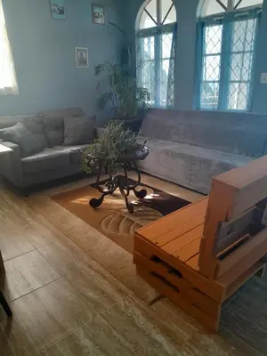 a living room with a couch and a coffee table at Abigail's Spectacular 2 bedrooms-Entire Apartment in Tortola Island